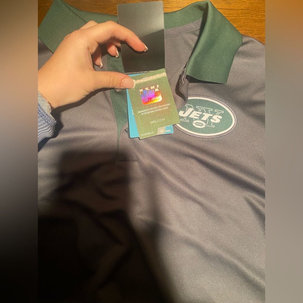 Men’s Jets nike polo size medium